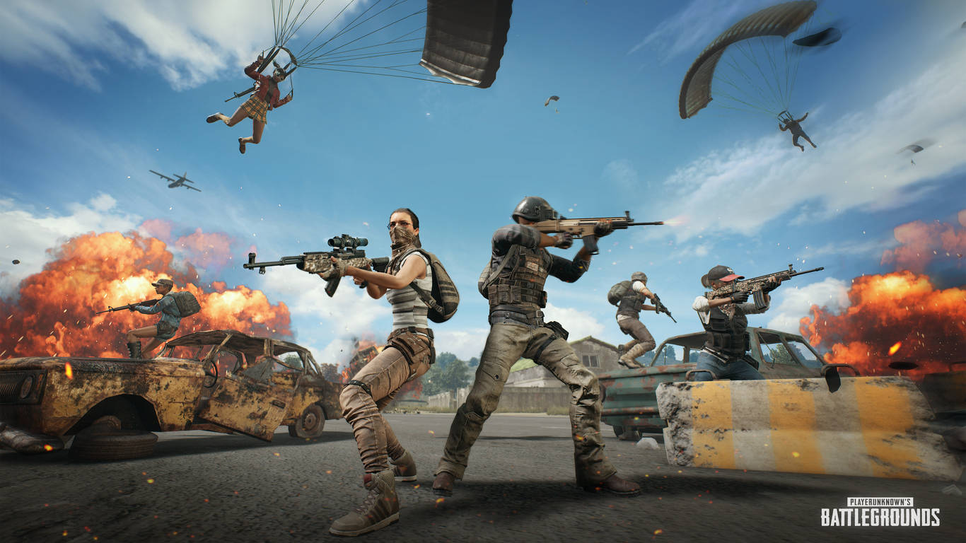Playerunknown's Battlegrounds 桌布 壁紙 — 身穿戰鬥裝備的士兵在爆炸和跳傘玩家中開火，呈現混亂的大逃殺場景。