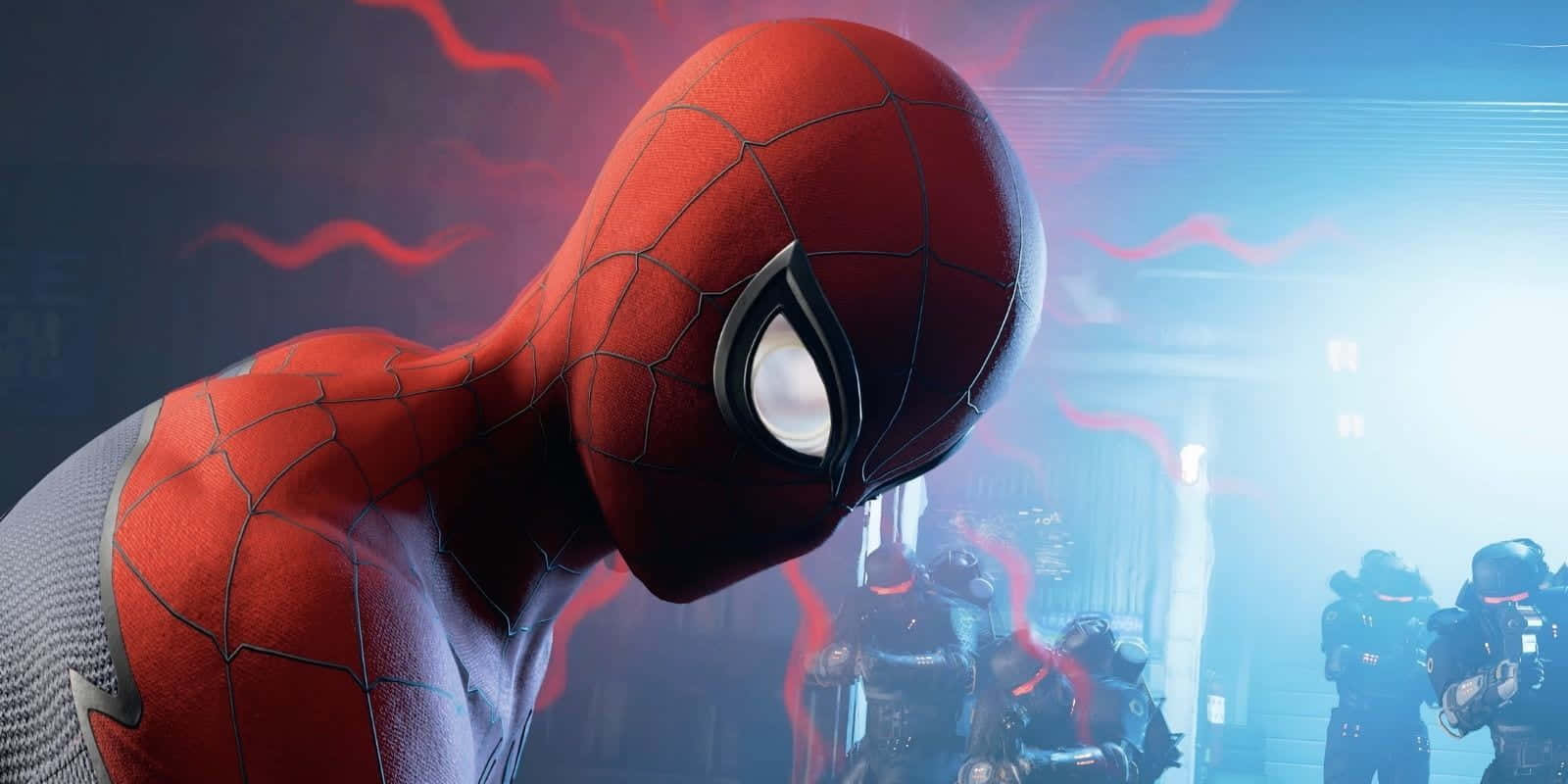 Spider-man Spider Sense 桌布 壁紙 — 身穿紅藍戰衣的蜘蛛俠，雙眼發光，直視前方，紅色能量在他周圍噼啪作響，背景是模糊的藍色和裝甲人物。