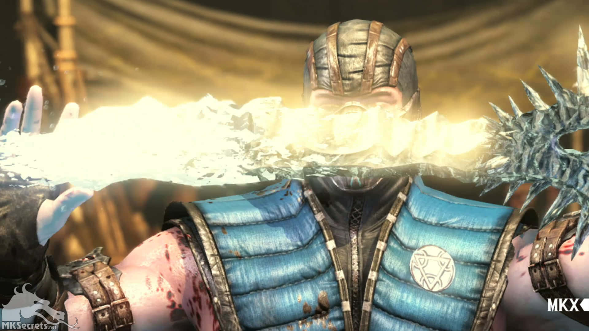 Mortal Kombat Sub-zero 桌布 壁紙 — 身穿藍色盔甲的戰士將冰冷能量匯聚成胸前閃耀的冰霜之刃。