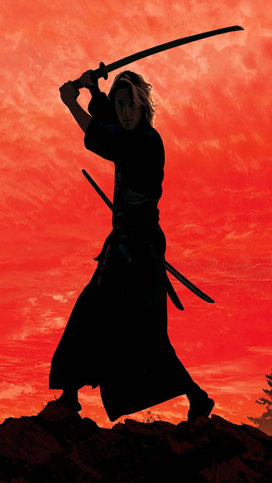 剪影中的武士戰士手持武士刀，背景是火紅的夕陽天空。