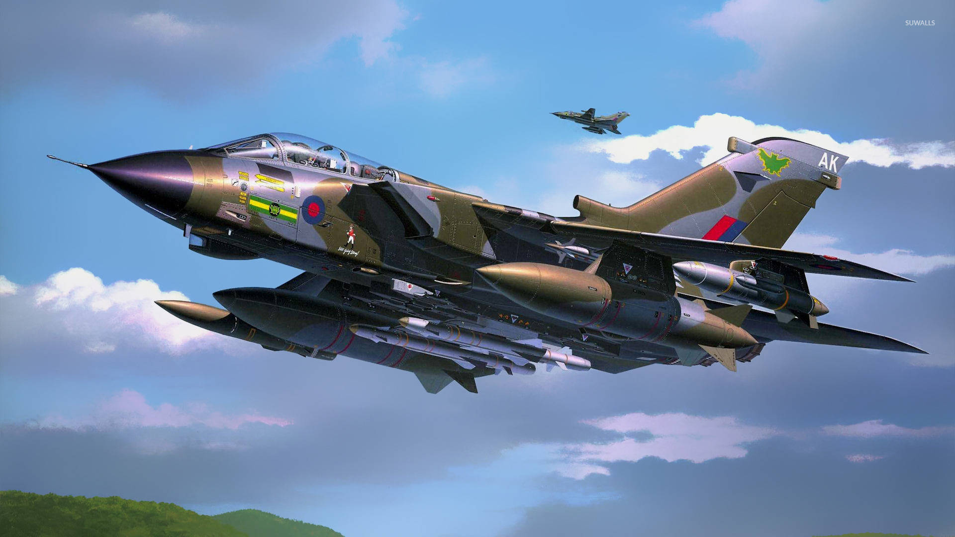 軍用戰鬥機疾馳天際 壁紙 — 一架英國戰鬥機攜帶導彈，在藍天白雲中急轉彎。