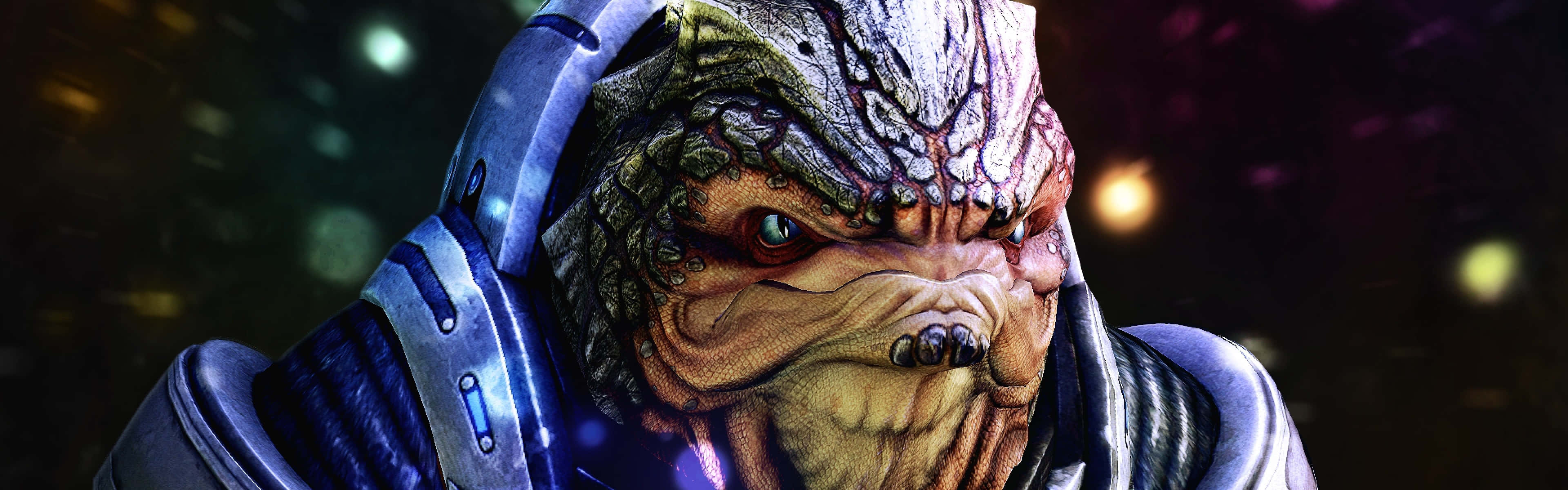 Mass Effect Grunt 桌布 壁紙 — 近距離拍攝一個身穿未來裝甲、帶有威脅性的外星戰士，背景是星光燦爛的宇宙。