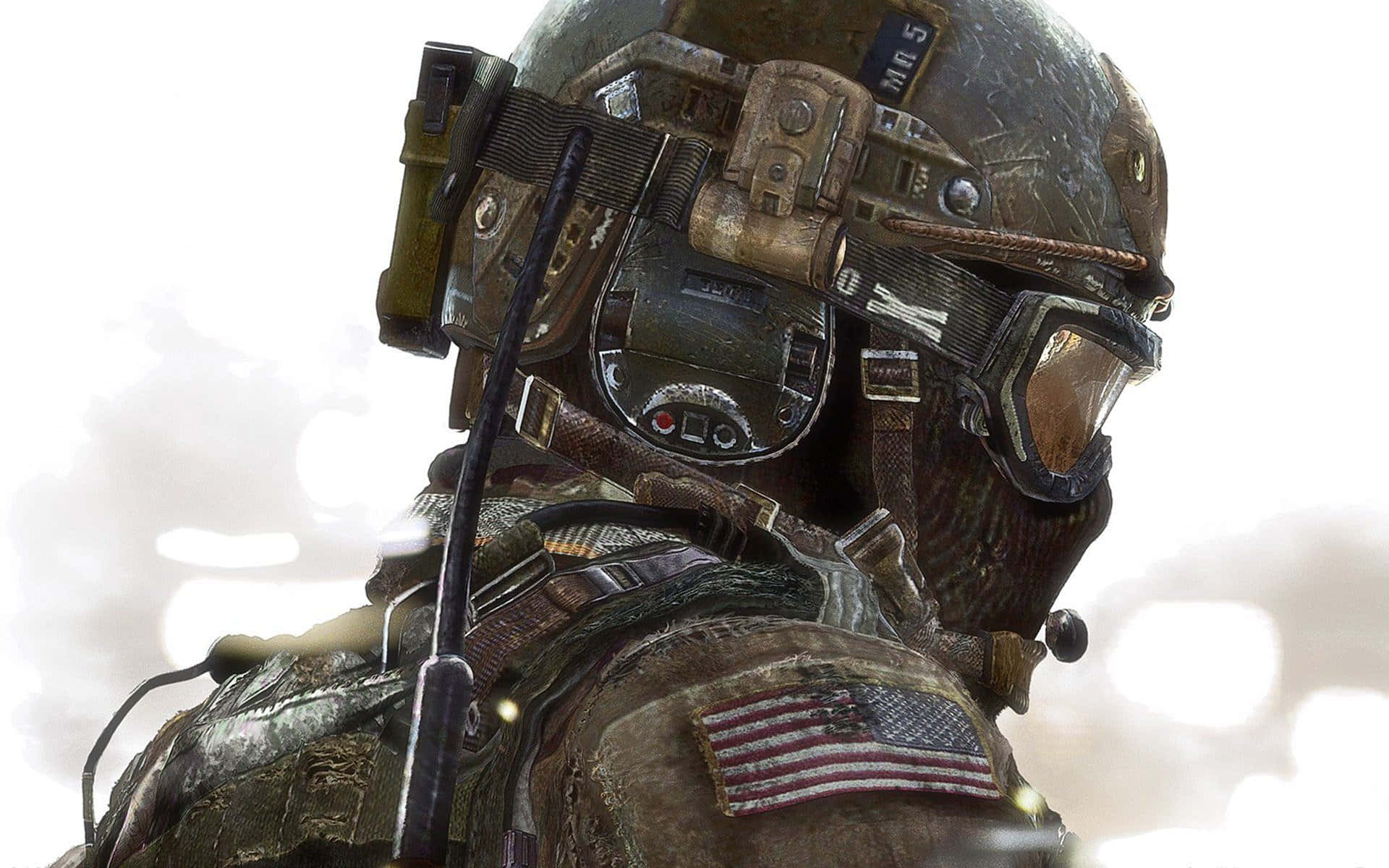 Call Of Duty Soldiers 桌布 壁紙 — 近距離拍攝一名身穿戰術裝備、帶有美國國旗臂章的士兵，背景明亮朦朧。