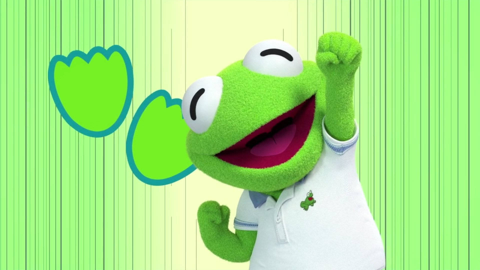 迪士尼小蛙寶貝超級克米特 壁紙 — Kermit the Frog 喺明亮綠色條紋背景上，帶住漂浮嘅鬱金香形狀，開心咁笑住舉起拳頭。