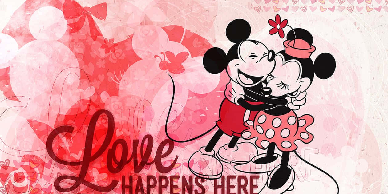 米奇和米妮老鼠在充滿愛意的擁抱中，伴隨心形和「Love Happens Here」文字。