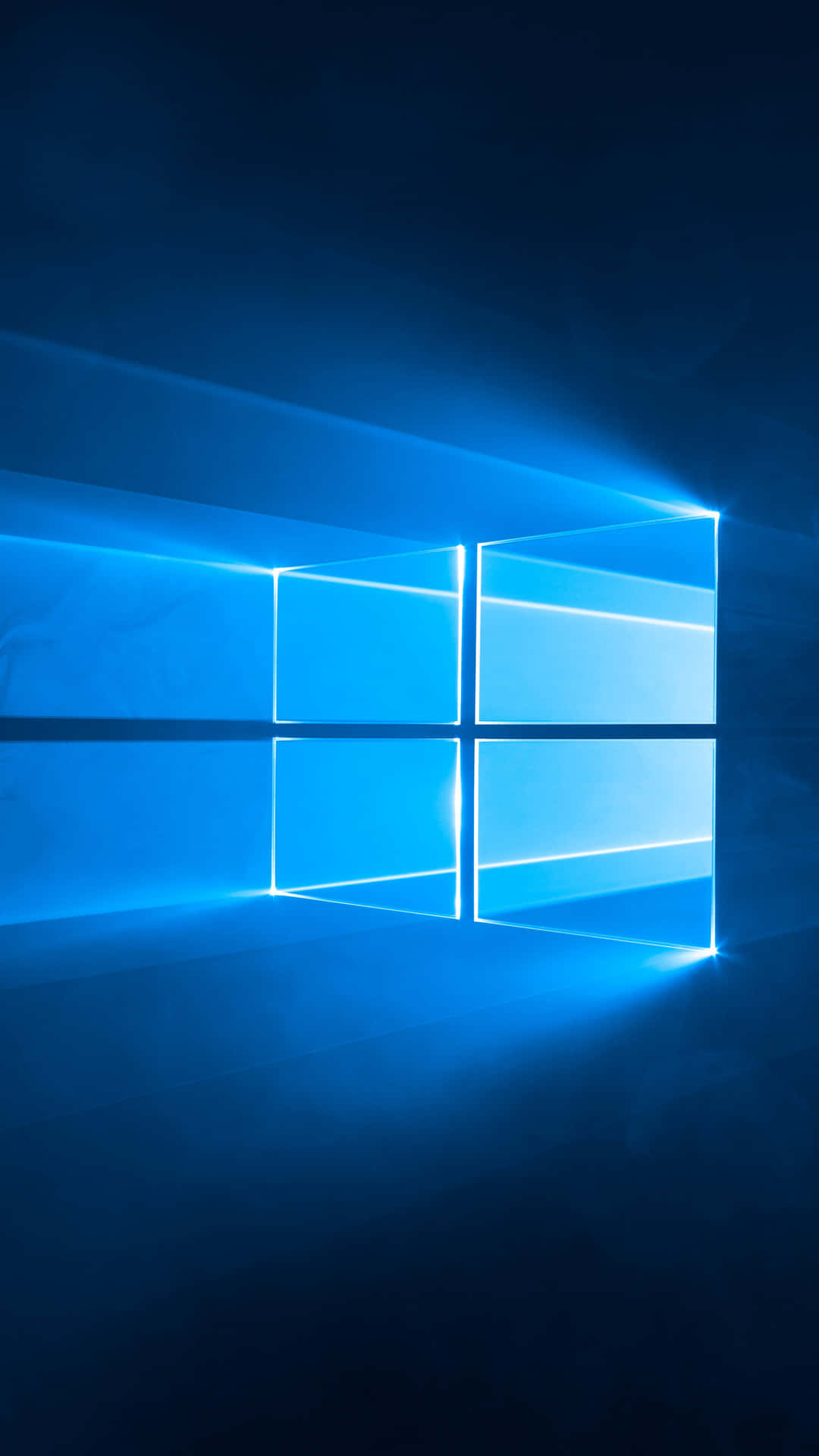 發光的藍色Windows標誌在黑暗房間中帶有光束