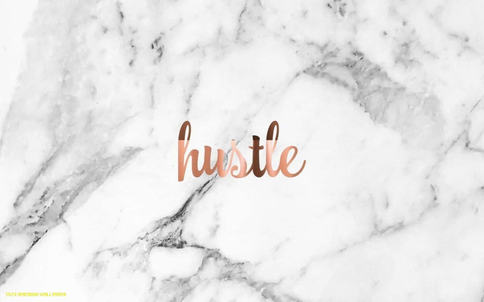 白色大理石背景上玫瑰金色的勵志詞語「hustle」