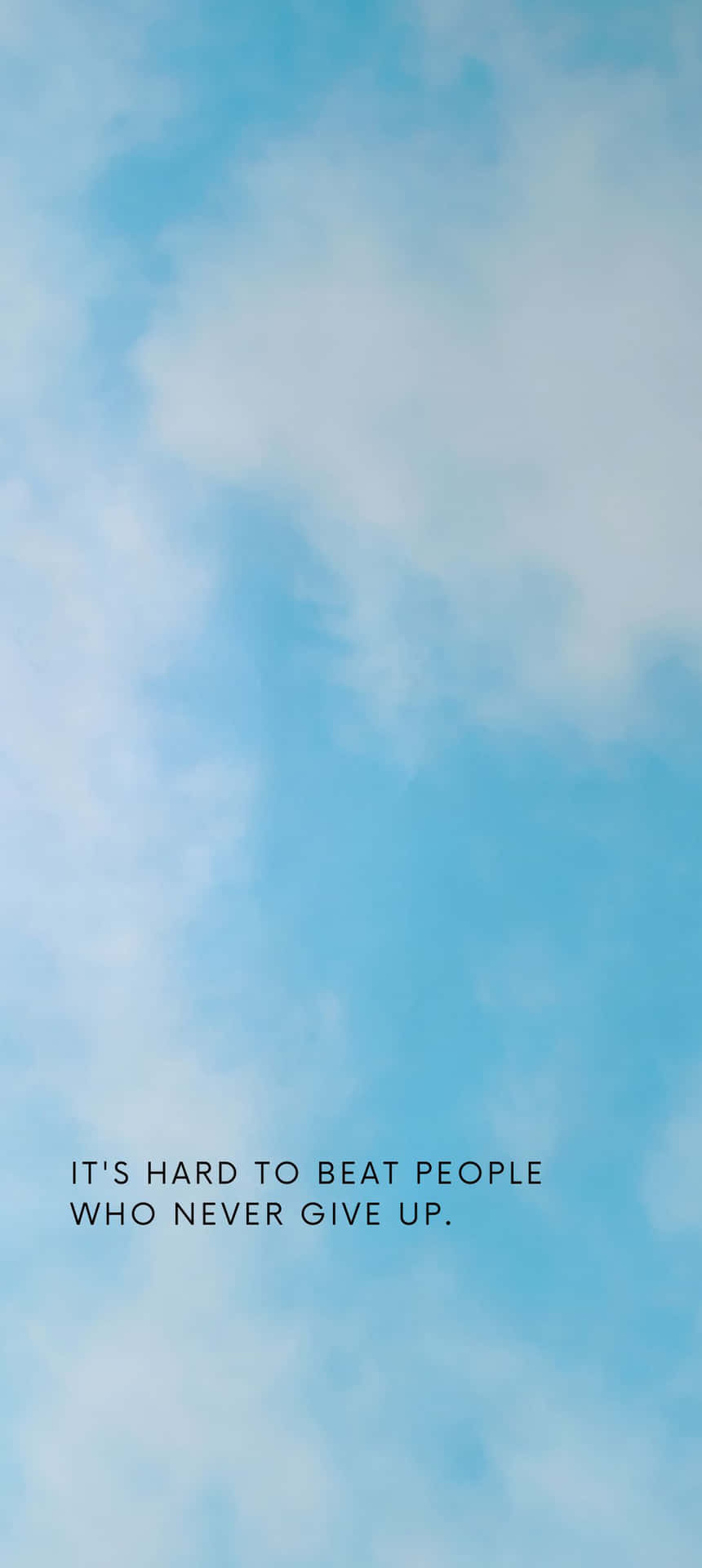 藍天白雲，附有永不放棄的文字。