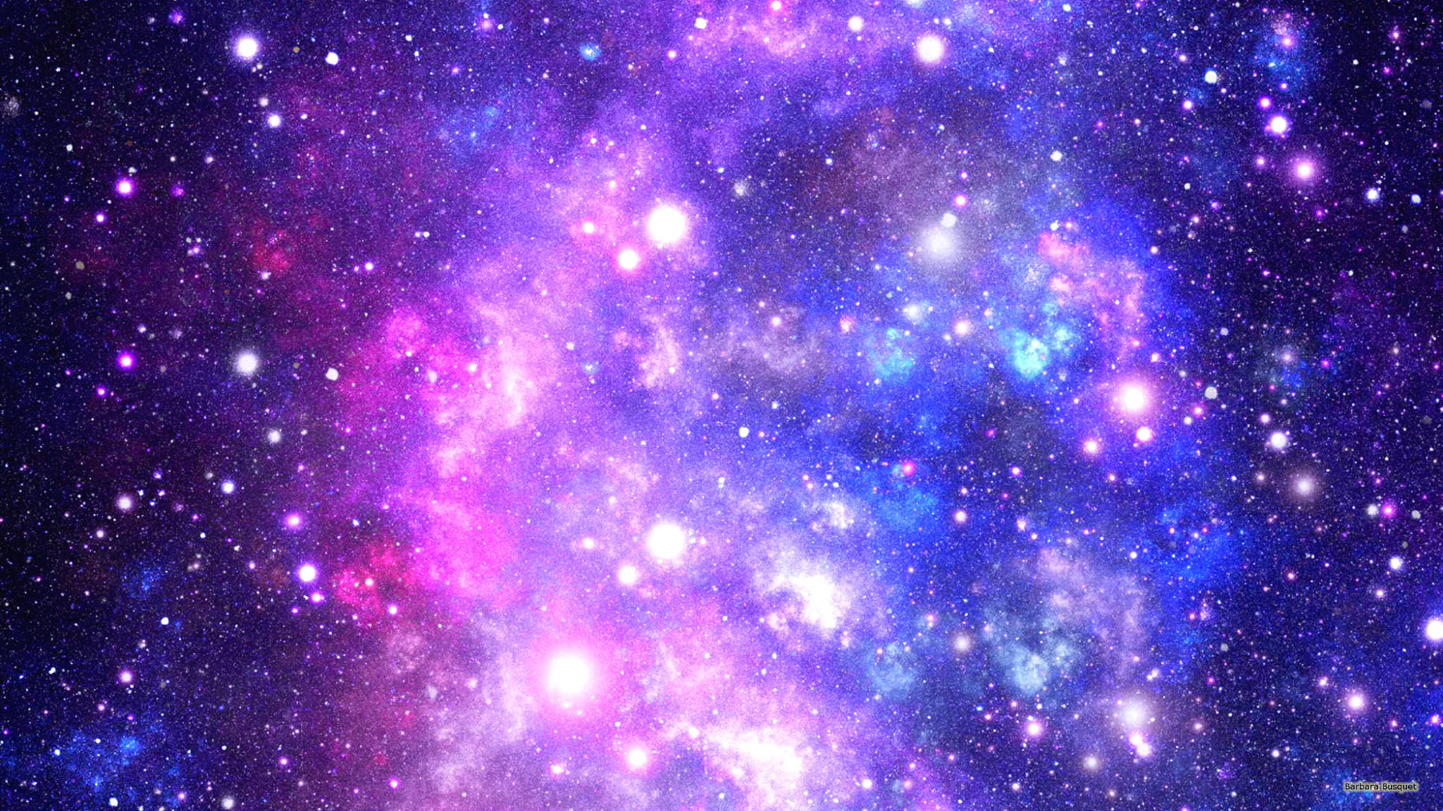 迷人藍紫星系 壁紙 — 一個充滿活力的宇宙星雲，以粉紅色、紫色和藍色調旋轉，點綴著發光的星星，映襯著黑暗的虛空。