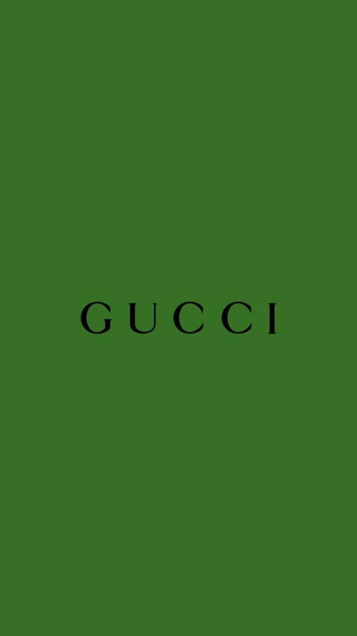綠色背景上的黑色Gucci標誌