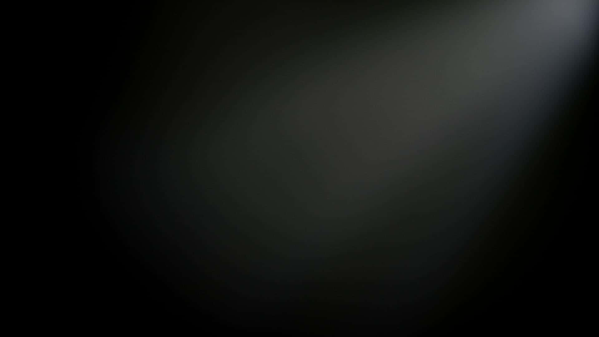 迷人黑色漸層壁紙 壁紙 — 一個深色漸變背景，右上角有柔和發光的光源。
