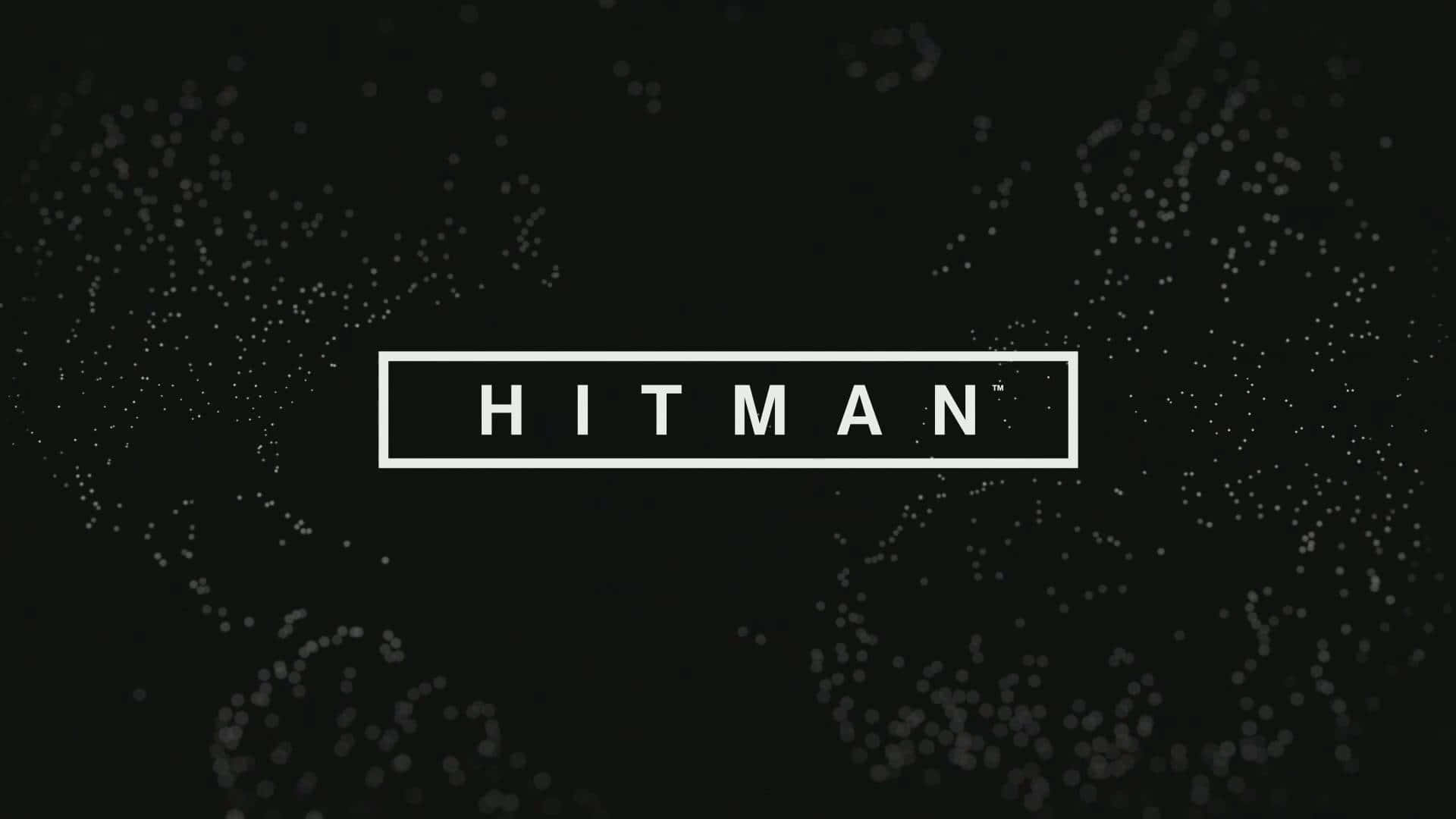 深色粒子背景上的矩形內白色 HITMAN 文字。