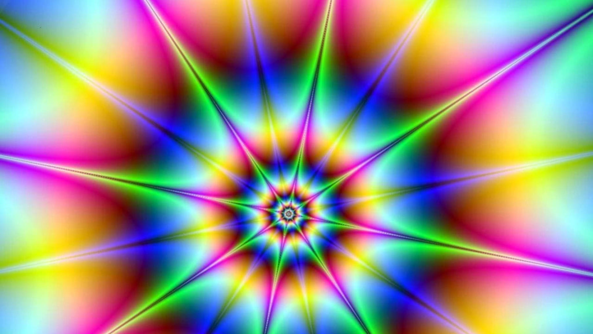 迷幻色彩催眠 壁紙 — 從中央星爆圖案散發出的鮮豔彩虹色彩的耀眼萬花筒爆炸。