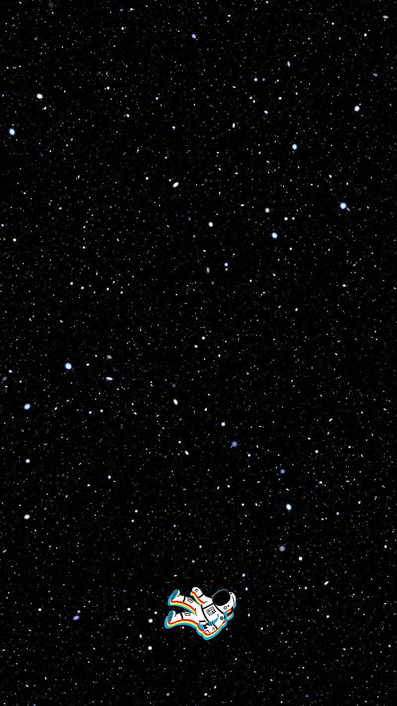 一個色彩繽紛的卡通太空人在繁星點點的夜空中漂流。