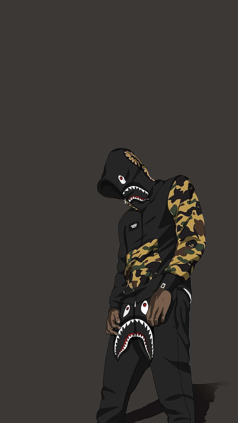 迷彩設計的酷 BAPE iPhone 6 壁紙 — 一個風格化的人物穿著鯊魚嘴連帽衫和迷彩袖子，站在深灰色背景前。