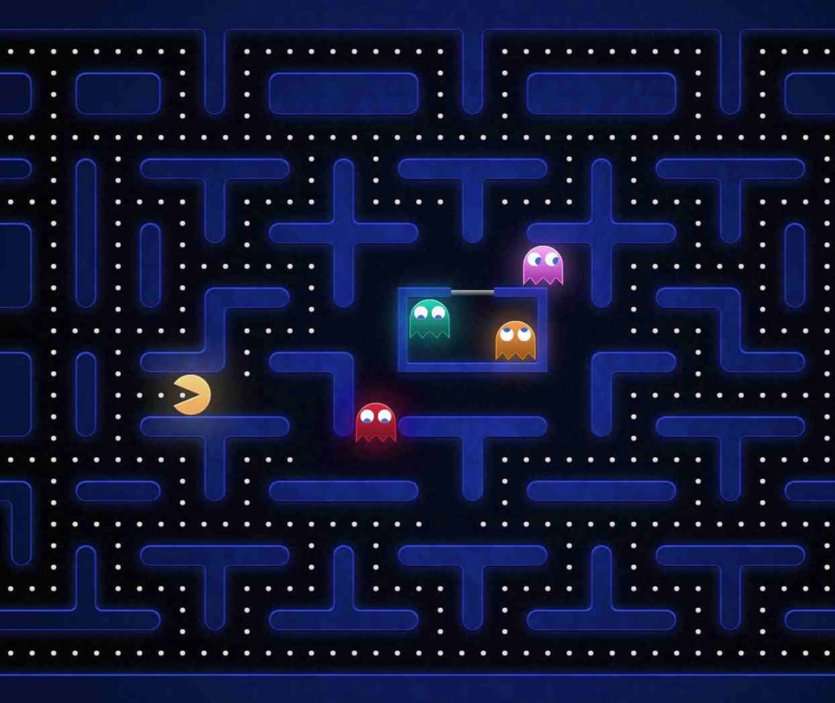 Pacman 在藍色迷宮中穿梭，四個鬼魂追趕著他。