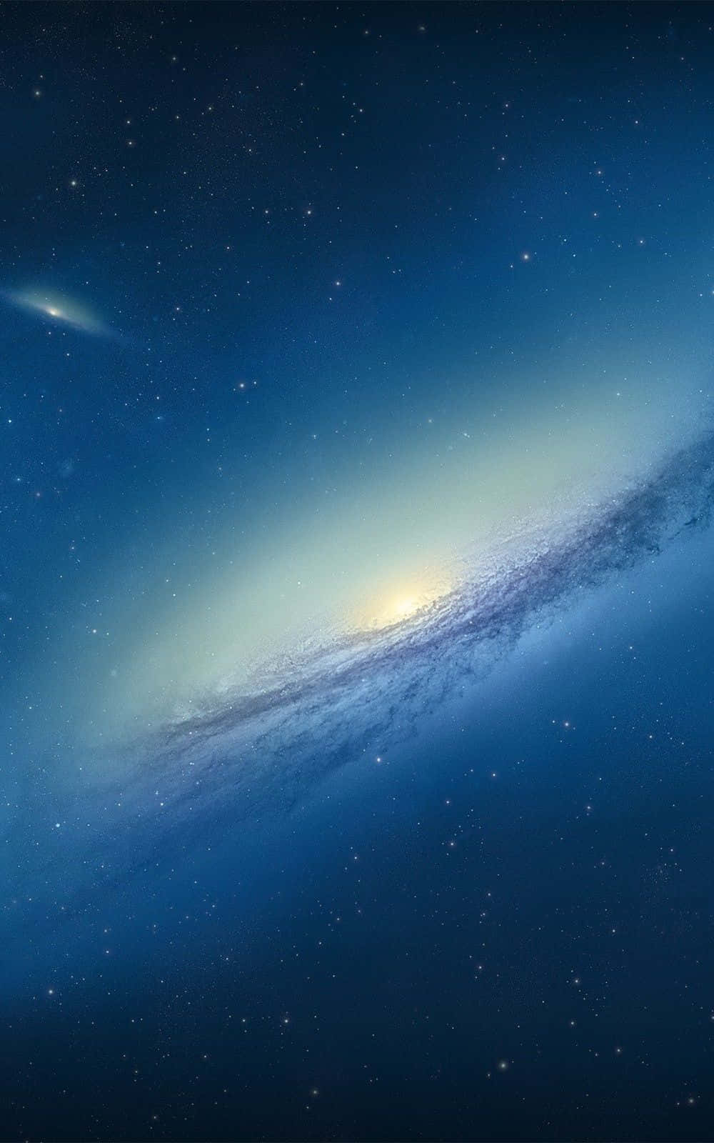 透過 Blue Space 揭開宇宙奧秘 壁紙 — 一個令人嘆為觀止的螺旋星系，在深藍色星場中閃耀著金色光芒。