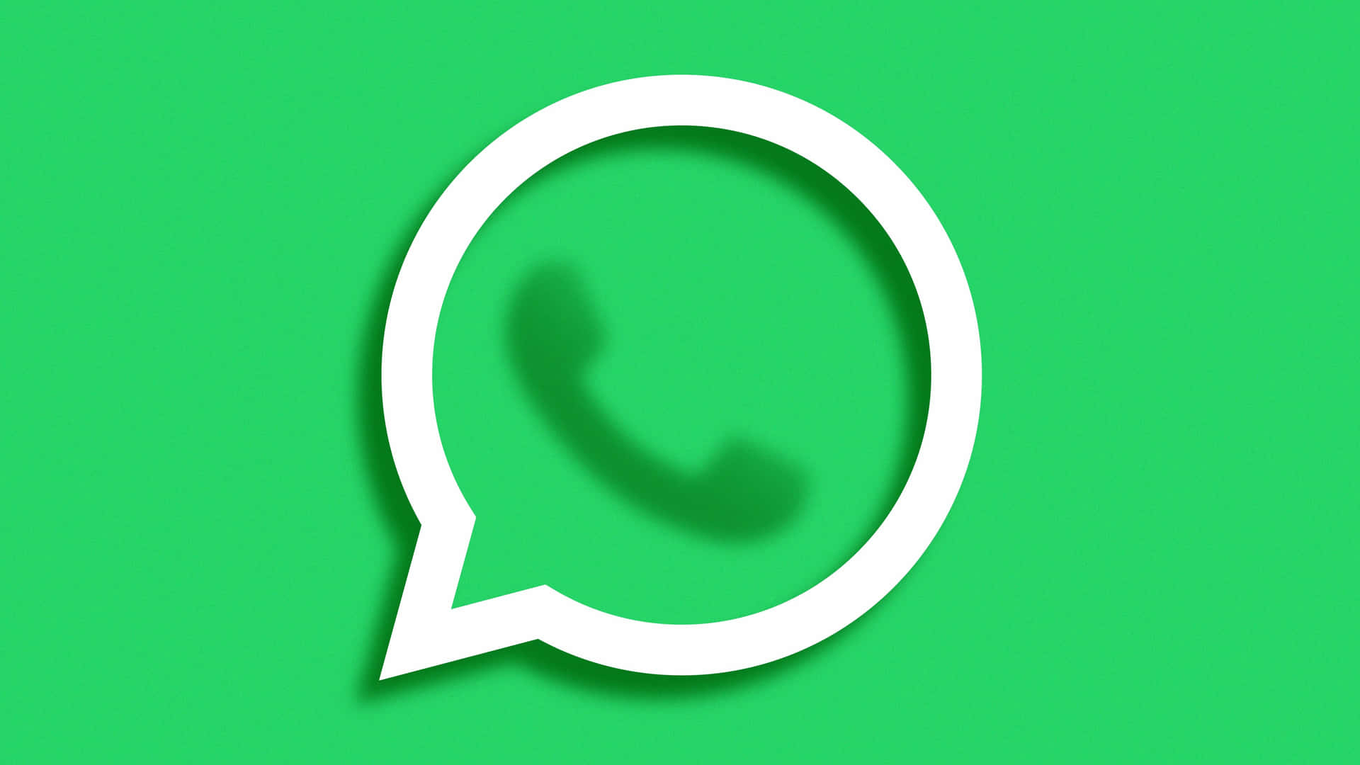 白色WhatsApp標誌在綠色背景上帶有柔和陰影