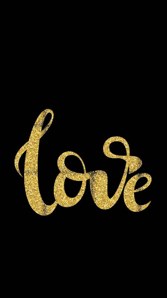 黑色背景上閃閃發光的金色草書字體「love」。