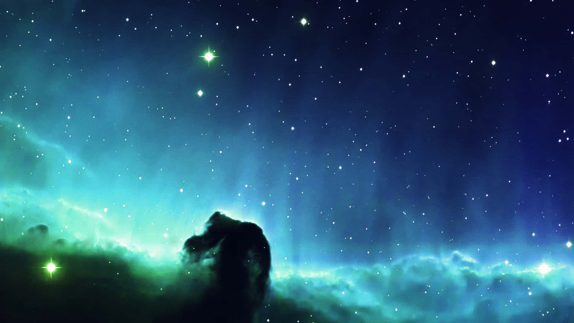 黑暗宇宙剪影，背景是發光的青綠色和藍色星雲，點綴著明亮的星星。