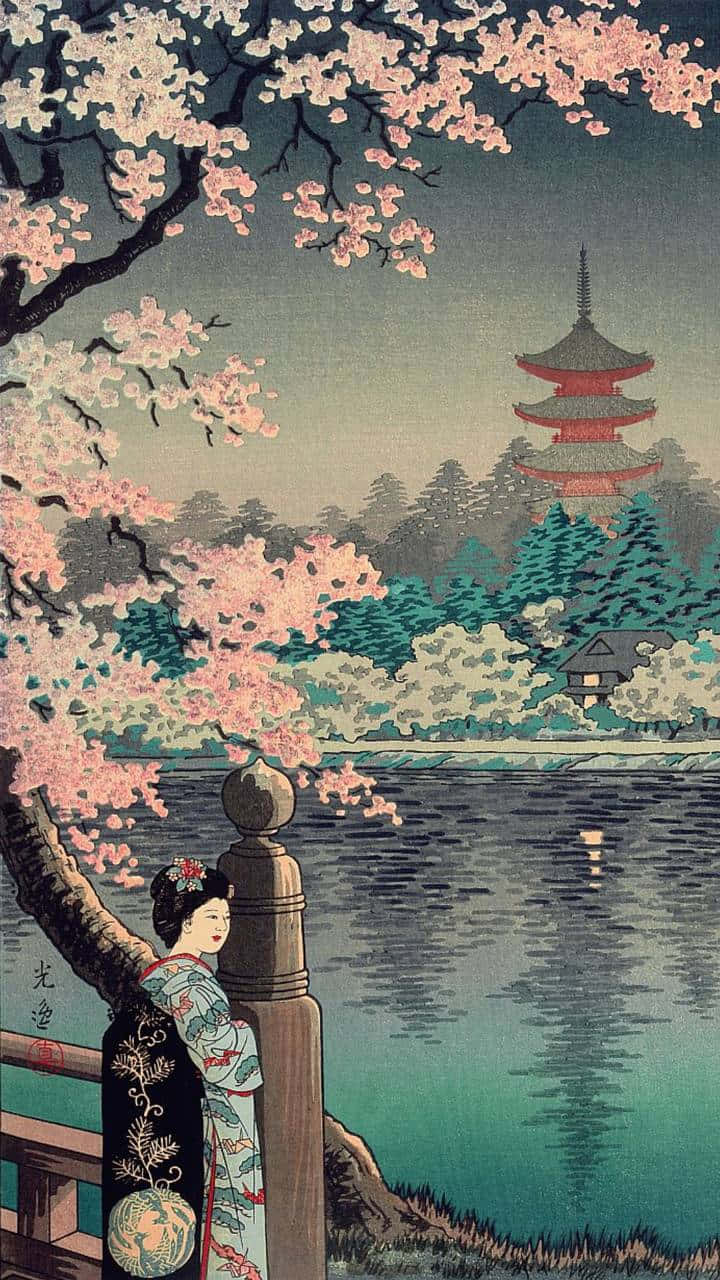 穿著和服的女性在櫻花下看著水對面的寶塔