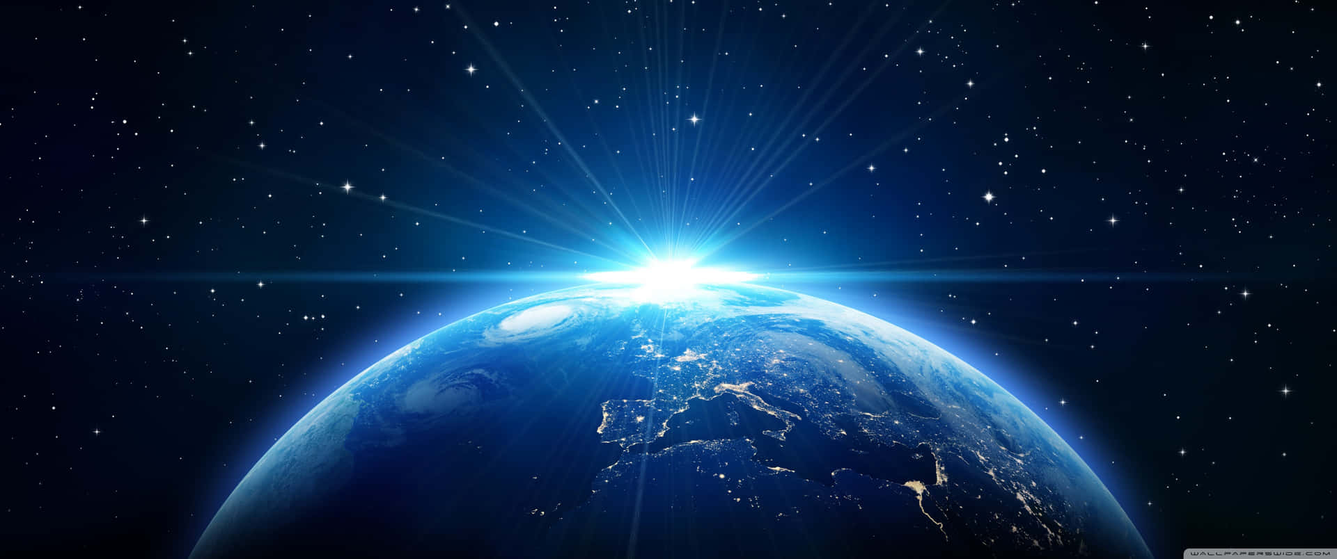從太空看到的地球，帶有發光的陽光和星空。