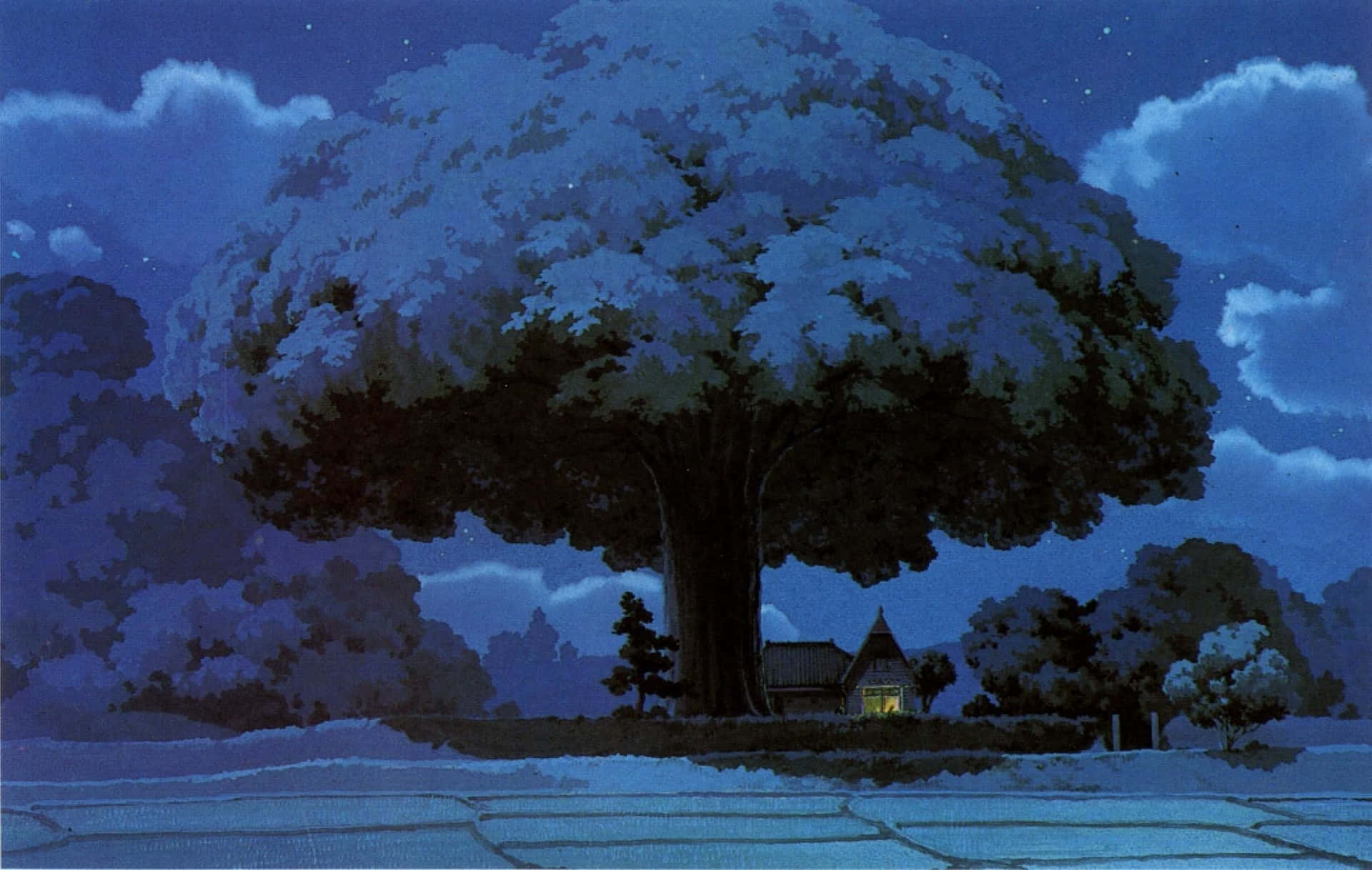 夜晚，雪覆蓋的稻田中，一棵巨樹下閃爍著光芒的小屋。