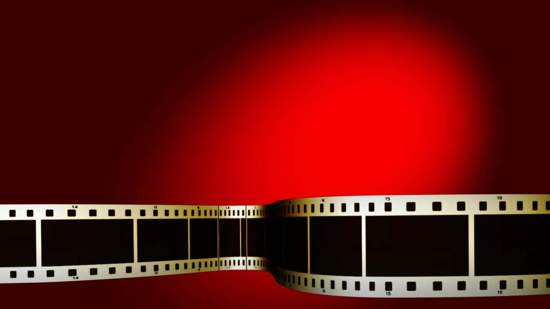 漸變紅色背景上的彎曲銀色菲林條