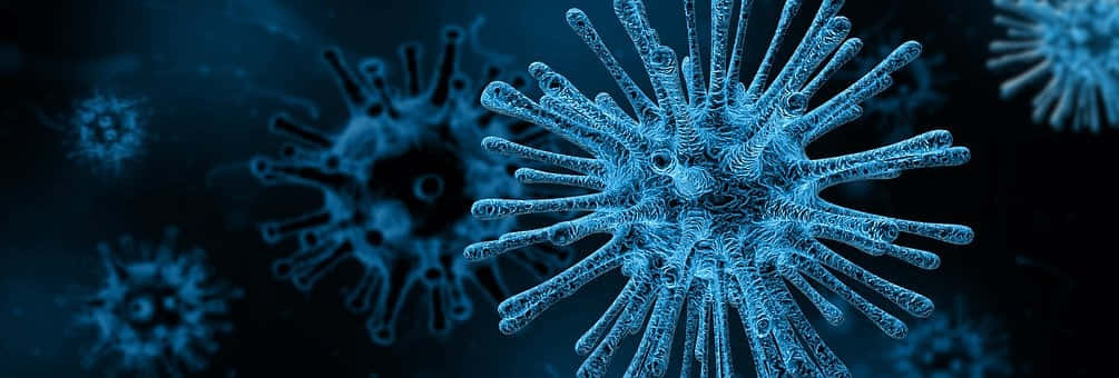 發光的藍色病毒粒子在黑暗空間中漂浮。