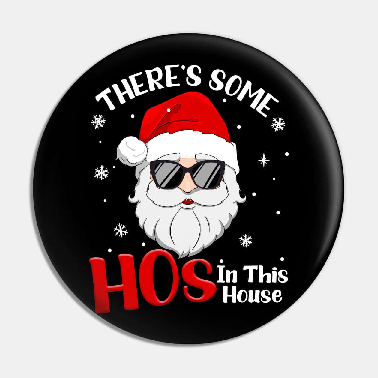 圓形鈕扣，上面有戴太陽眼鏡的卡通聖誕老人和文字「There's Some HOS In This House」。