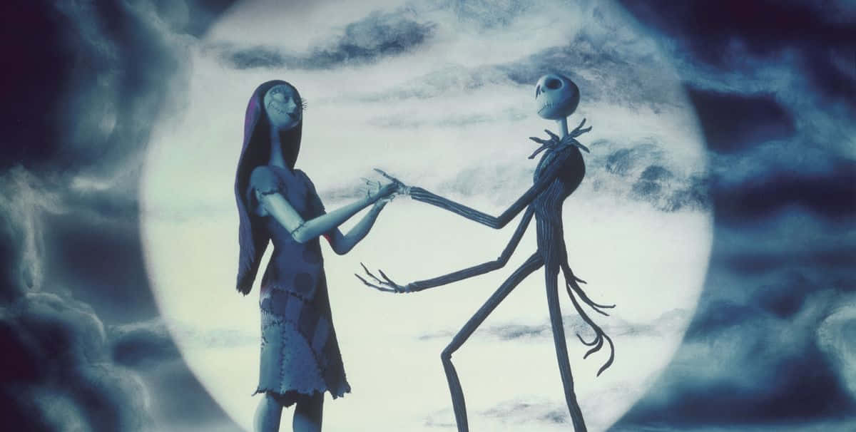 Jack 和 Sally 在黑暗天空的滿月下跳舞。