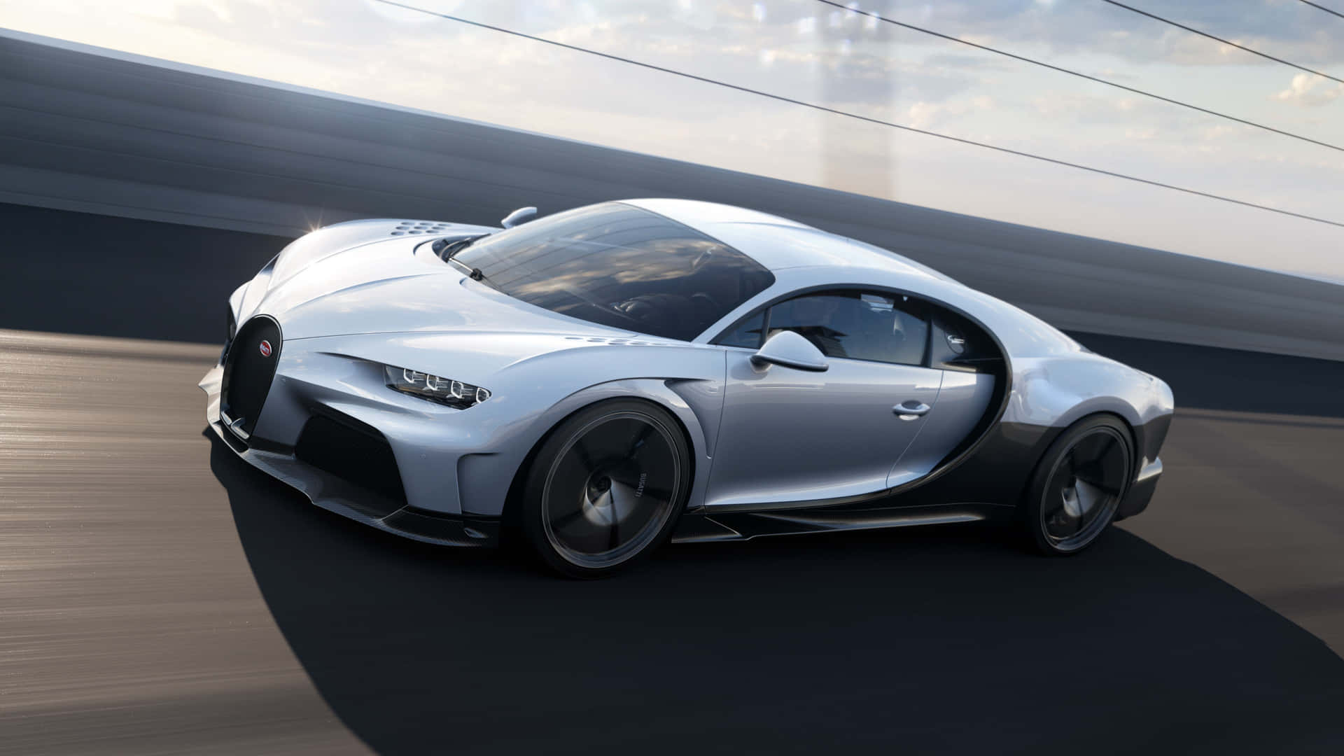 銀色Bugatti Chiron在高速公路上高速行駛，背景呈現動態模糊效果。