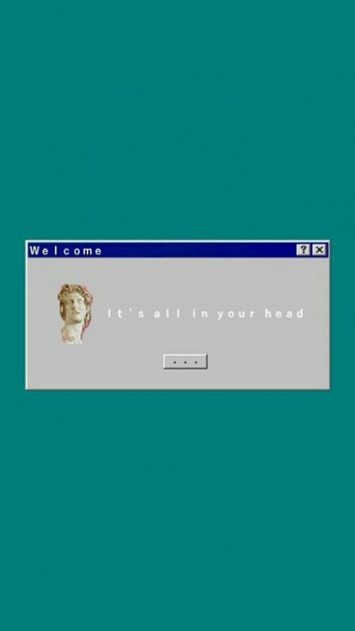 復古電腦視窗，帶有半身像及文字 it's all in your head，背景為青綠色。