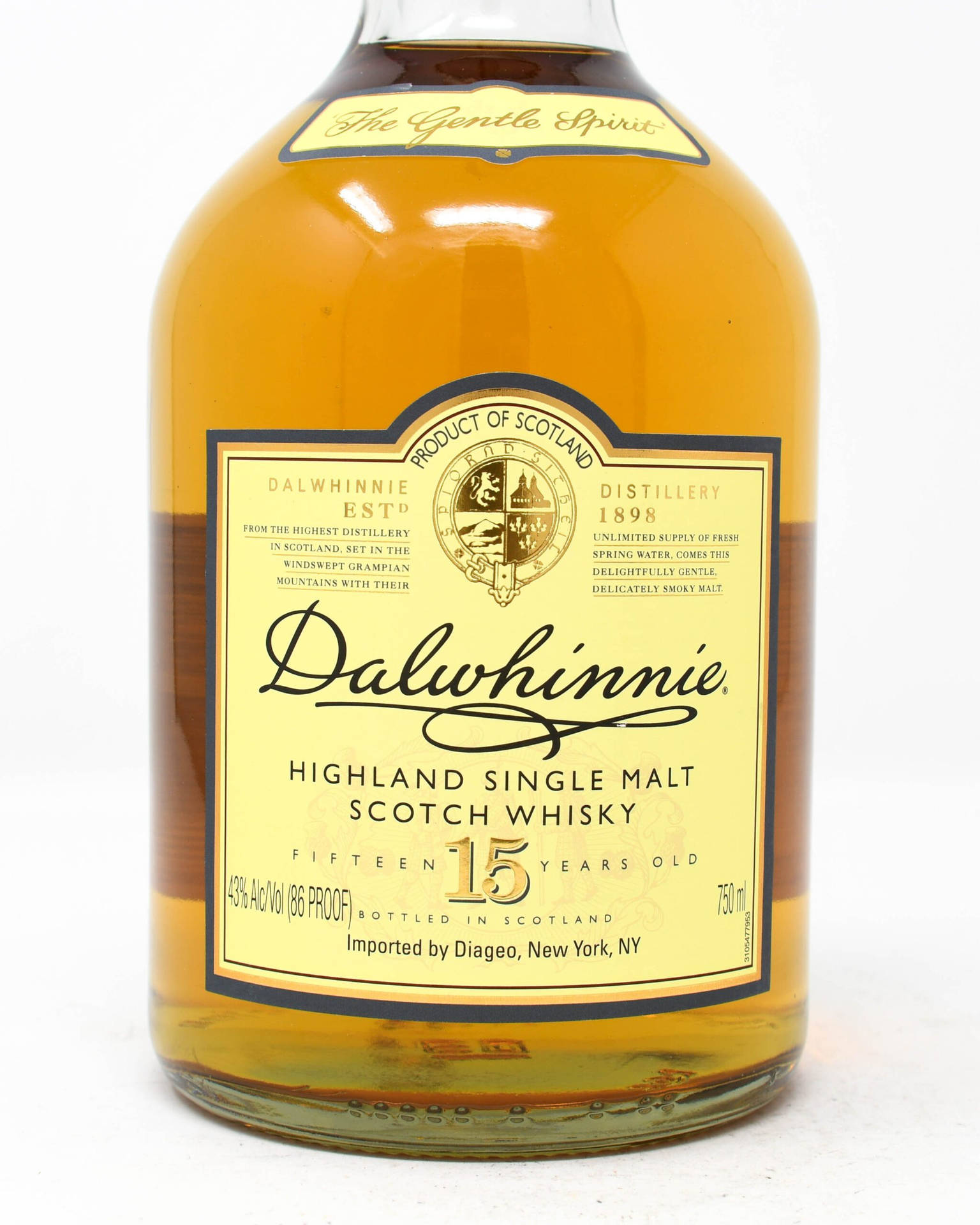 Dalwhinnie 15年蘇格蘭威士忌酒瓶，帶有金色液體和詳細標籤。