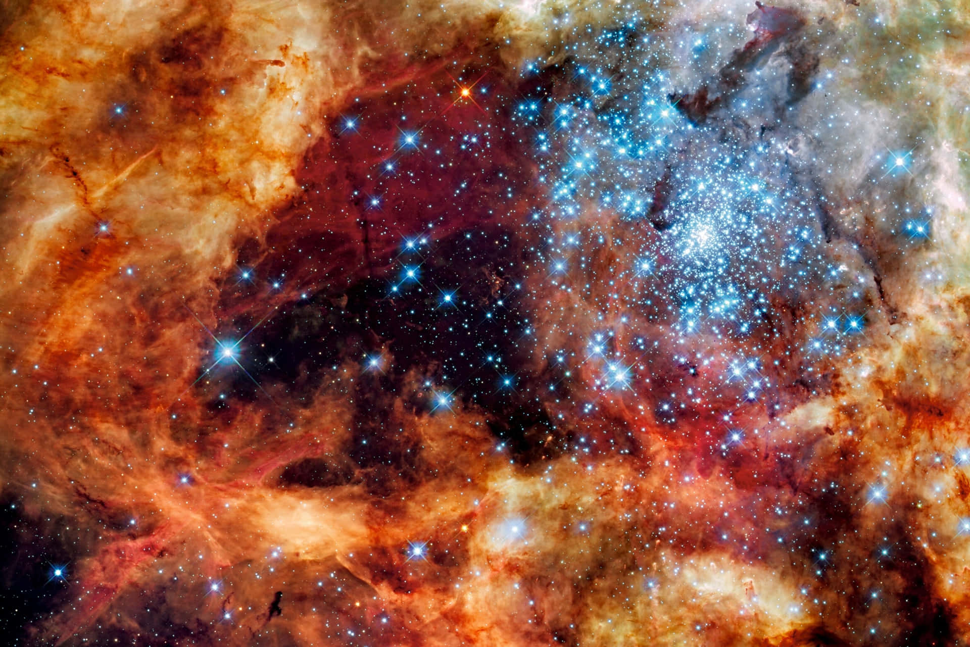 色彩繽紛的星雲，充滿了發光的恆星和深空中的宇宙塵埃雲。