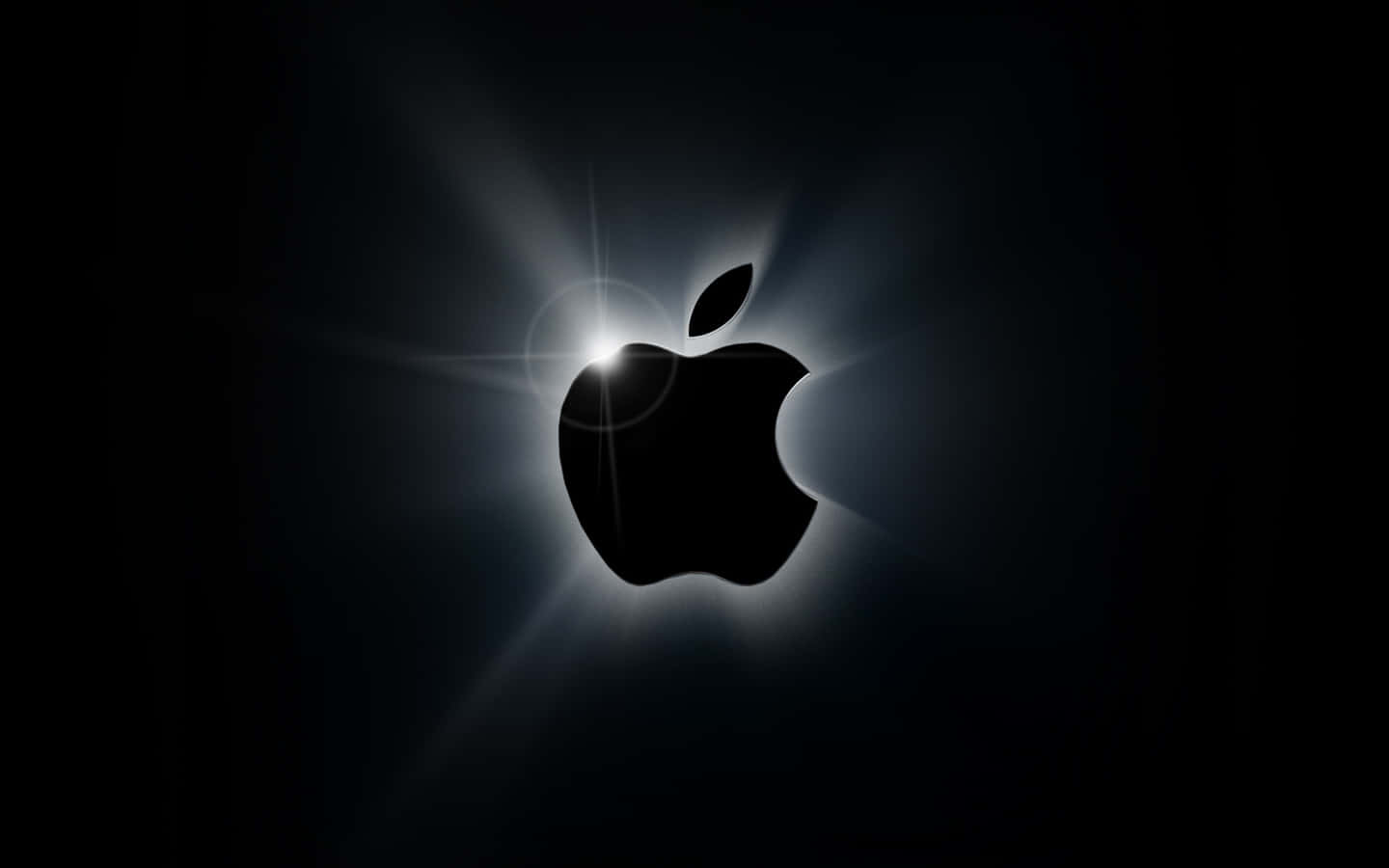 Apple標誌在黑暗背景上發光並帶有光線