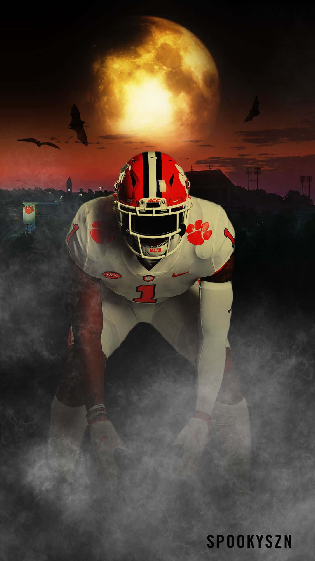 身穿白色和橙色球衣的足球員在發光月亮下的霧中蹲下，蝙蝠飛翔。
