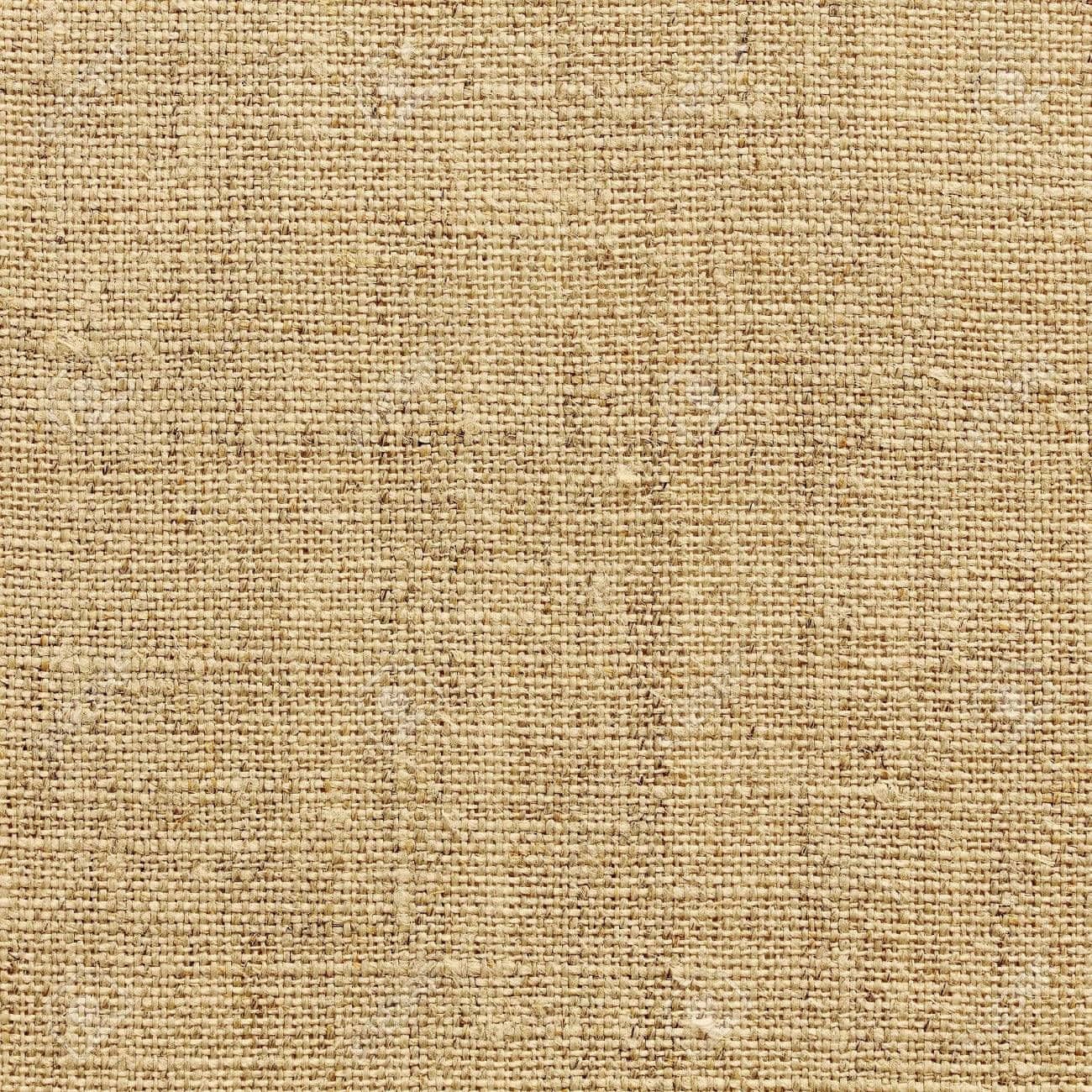 米色麻布特寫，展示編織紋理及天然纖維。