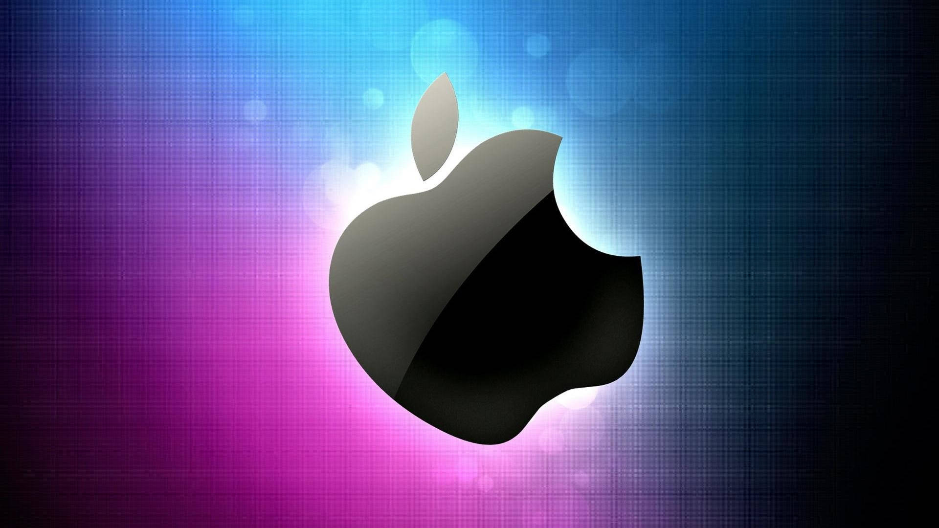 酷PC蘋果標誌 壁紙 — 一個時尚的黑色Apple標誌在藍色和紫色的鮮豔漸變中發光，帶有柔和的散景燈光。