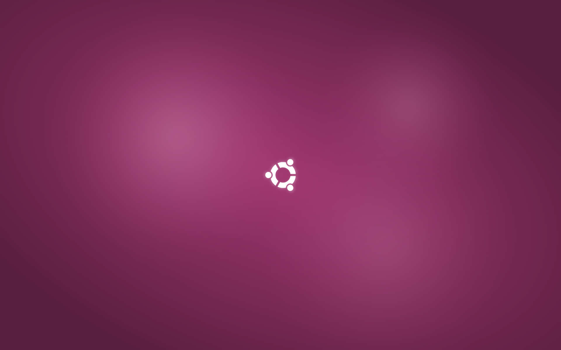 Ubuntu標誌在柔和的洋紅色漸變背景上