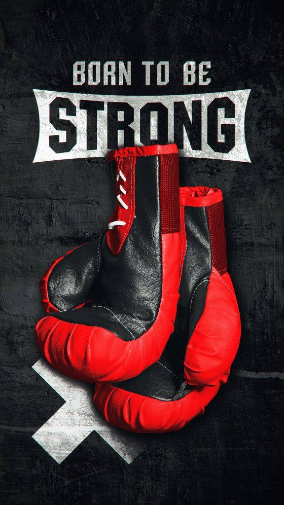 紅色和黑色的拳擊手套，在深色紋理牆壁上帶有「Born to be Strong」文字。