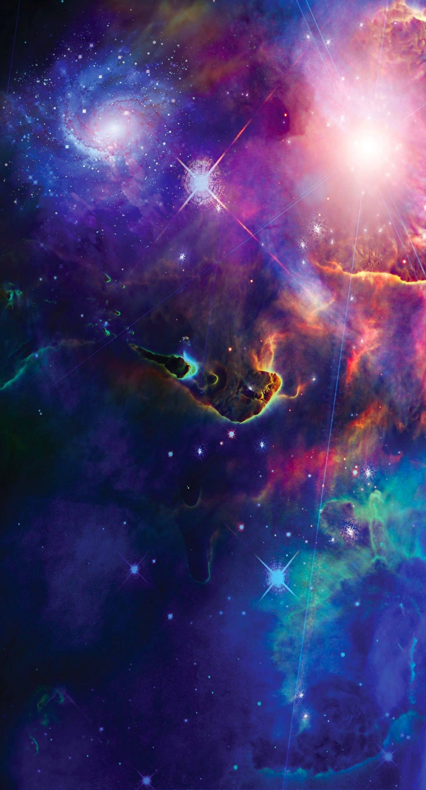 酷炫星系星雲 壁紙 — 一個充滿活力的宇宙星雲，旋轉著紫色、藍色和粉紅色的雲層，由明亮的星星和發光的氣體結構照亮。
