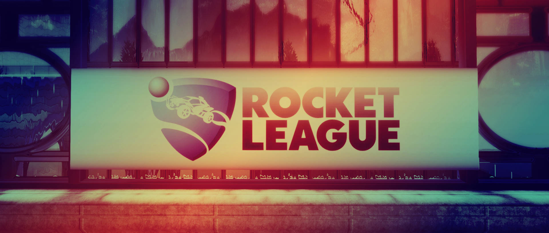 建築物上的Rocket League遊戲橫幅，帶有色彩繽紛的日落反射。