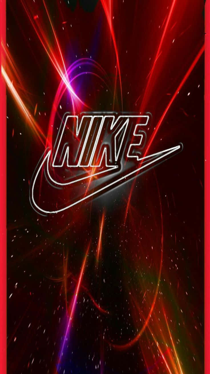醒目紅色Nike運動鞋 壁紙 — Nike 標誌在宇宙黑暗背景上閃爍著電光紅和紫色條紋，並帶有閃爍的粒子。