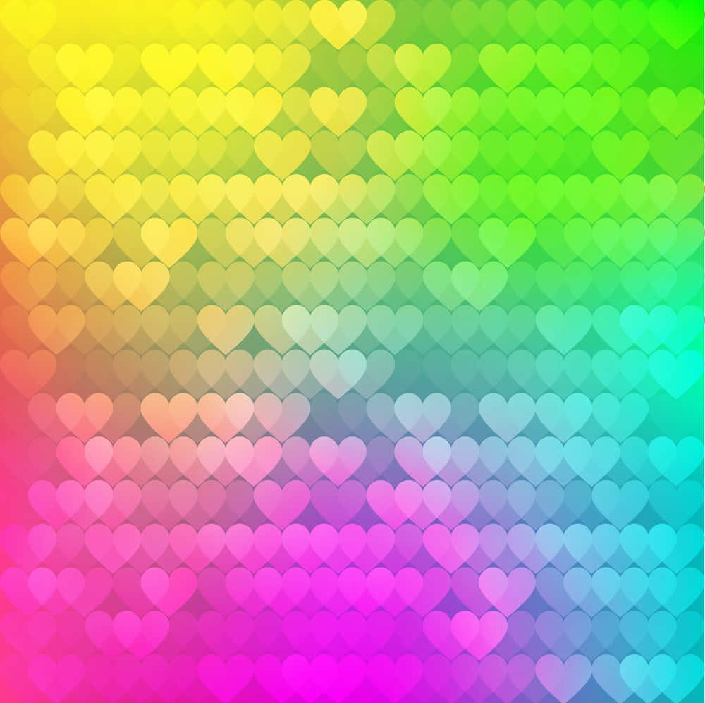 Rainbow Heart 桌布 壁紙 — 重疊的半透明心形形成鮮豔的彩虹漸變，營造出閃爍夢幻的圖案。