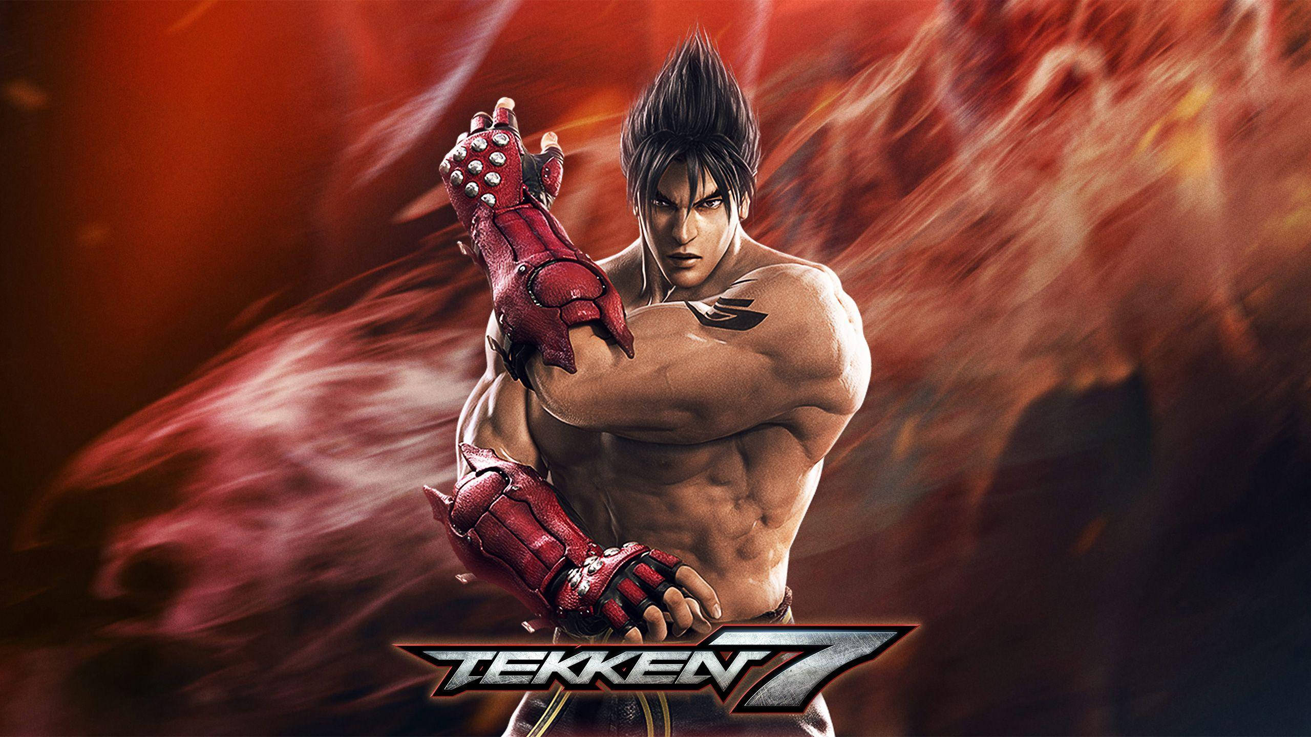 金· Kazama Tekken 7 遊戲 壁紙 — 一位肌肉發達的戰士戴著紅色手套，在熾熱的紅色背景前準備就緒，背景上有Tekken 7標誌。