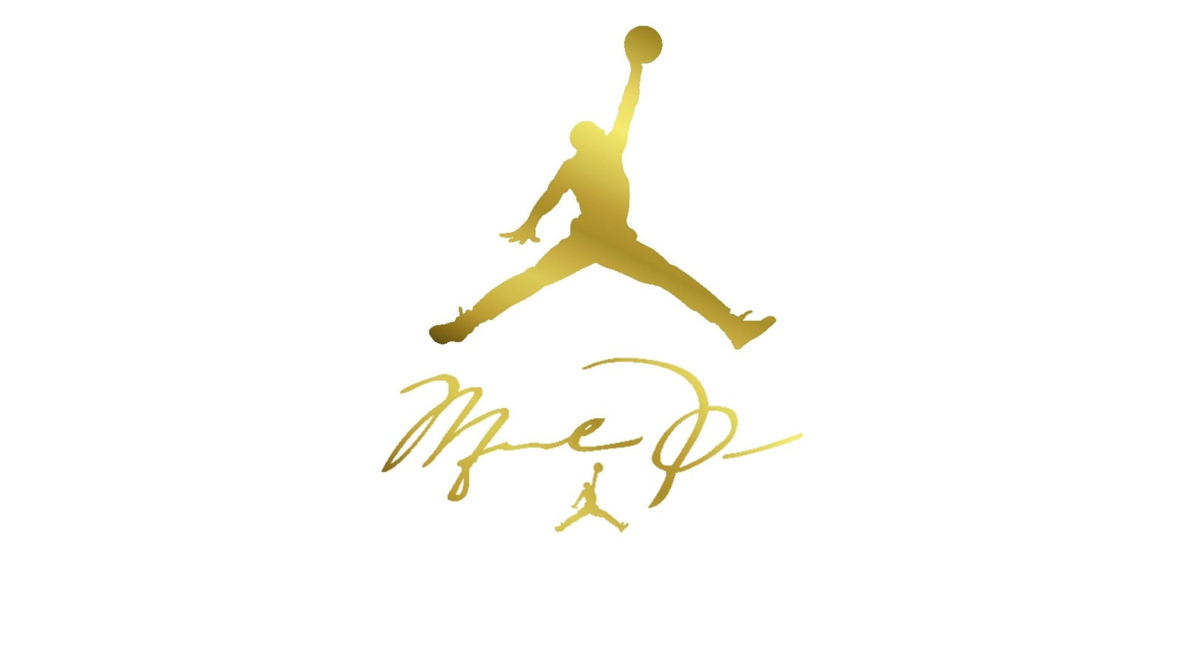 金屬 Air Jordan 簽名款 壁紙 — 白色背景上，一個籃球運動員在空中入樽的金色剪影，下方有簽名。