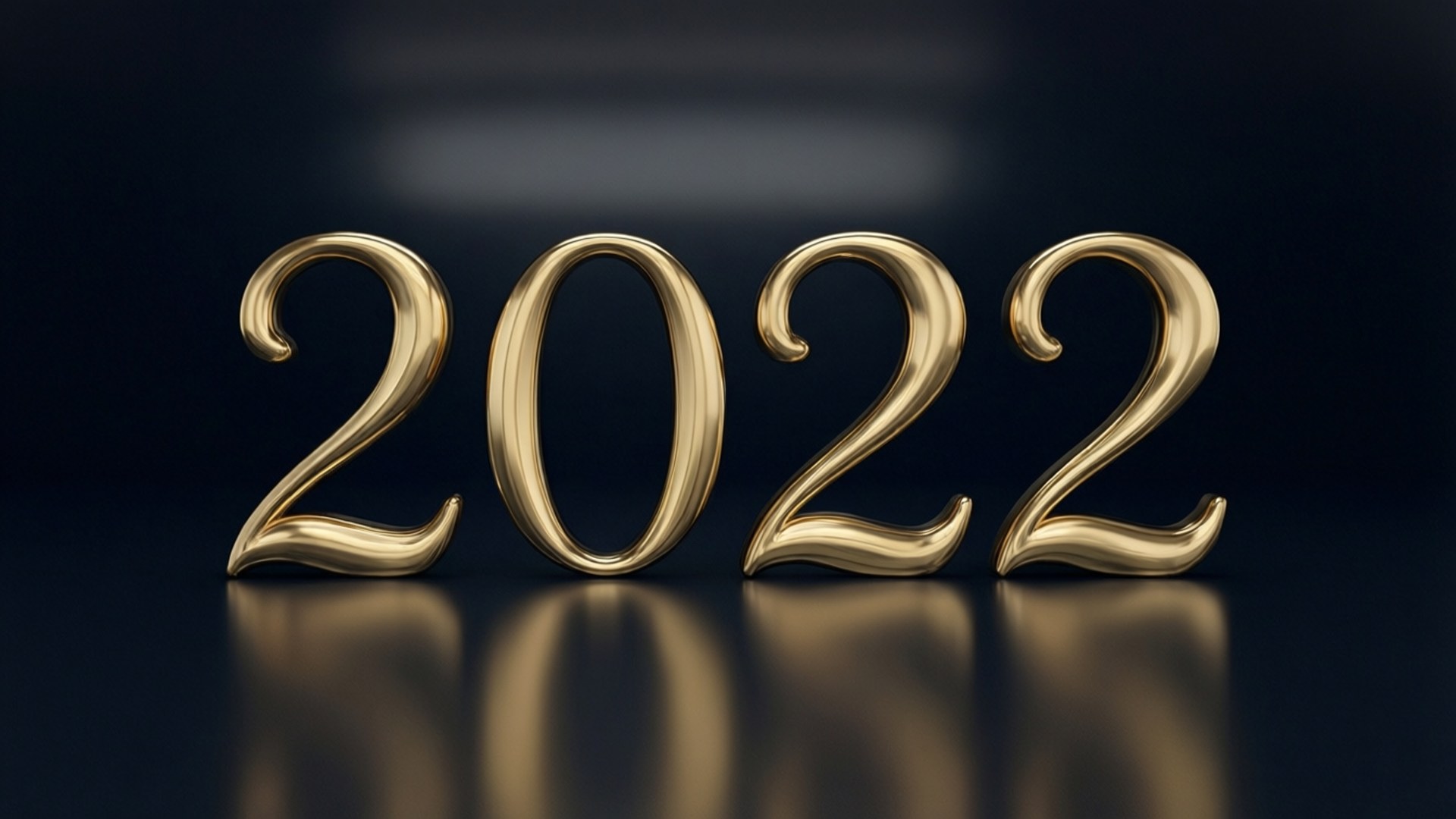 深色反光表面上的金色3D數字2022