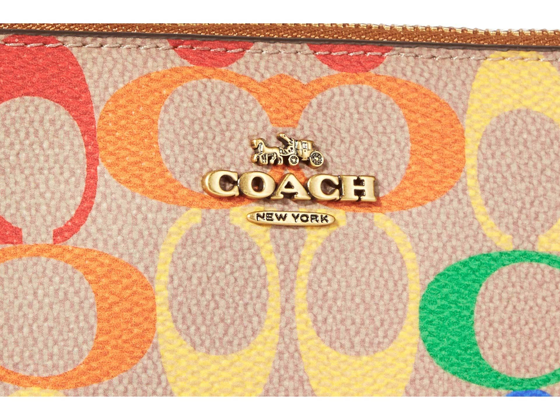 Coach 錢包，在紋理米色皮革上帶有彩色C標誌圖案。