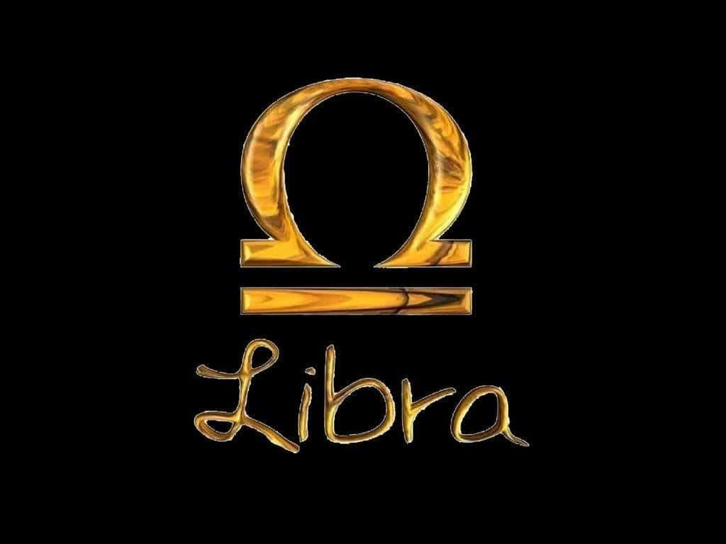libra 桌布 壁紙 — 金色天秤座星座符號和文字在純黑色背景上閃耀，帶有金屬反射效果。